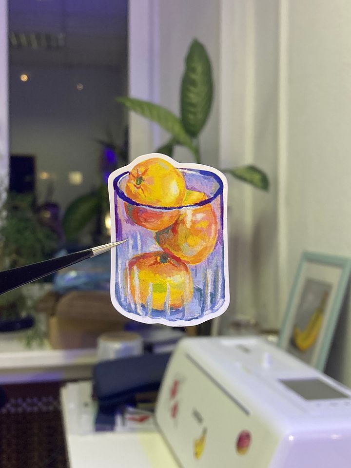 Glass of tangerines sticker product image (1)