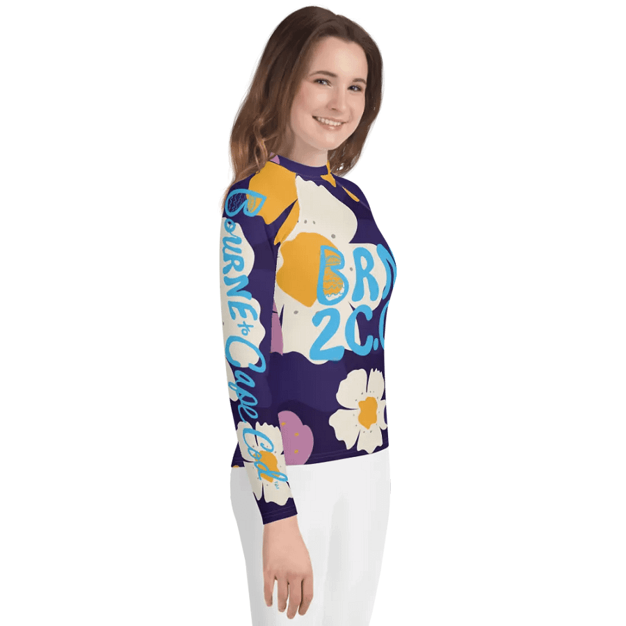 Girls' | YOUTH | Rash Guard | BRN.2C.C.™ Front Graphic | BOURNE to Cape Cod™ Sleeve & Back Logo | Coastal Swim Shirt for Kids | UV Protection Activewear | Blue Logo | Bold Purple Floral product image (4)