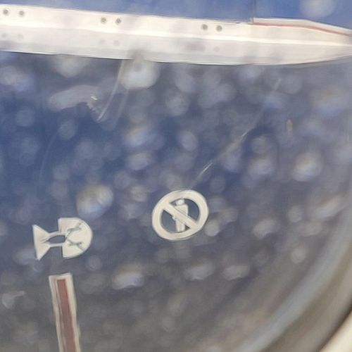 Boeing would like to remind you that there is no men's restroom in the engine compartment.