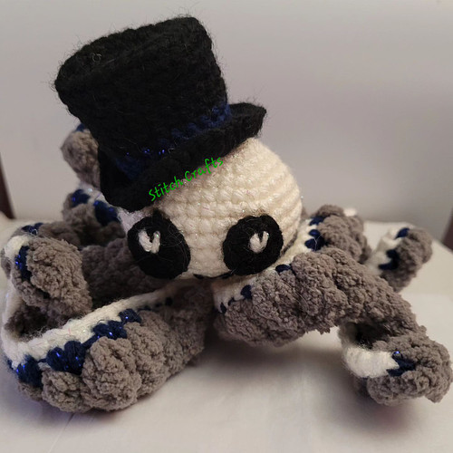 This little dapper octopus will soon be listed in my shop. I used twinkle yarn from big twist in the colors white and sapphir...