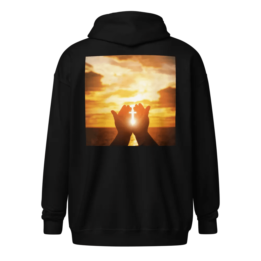 Cupped hands holding a glowing cross silhouette Hoodie product image (1)