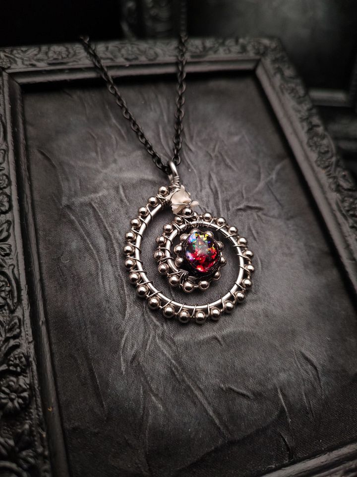 Wrapped Talisman - Blood Galaxy Coil I product image (1)