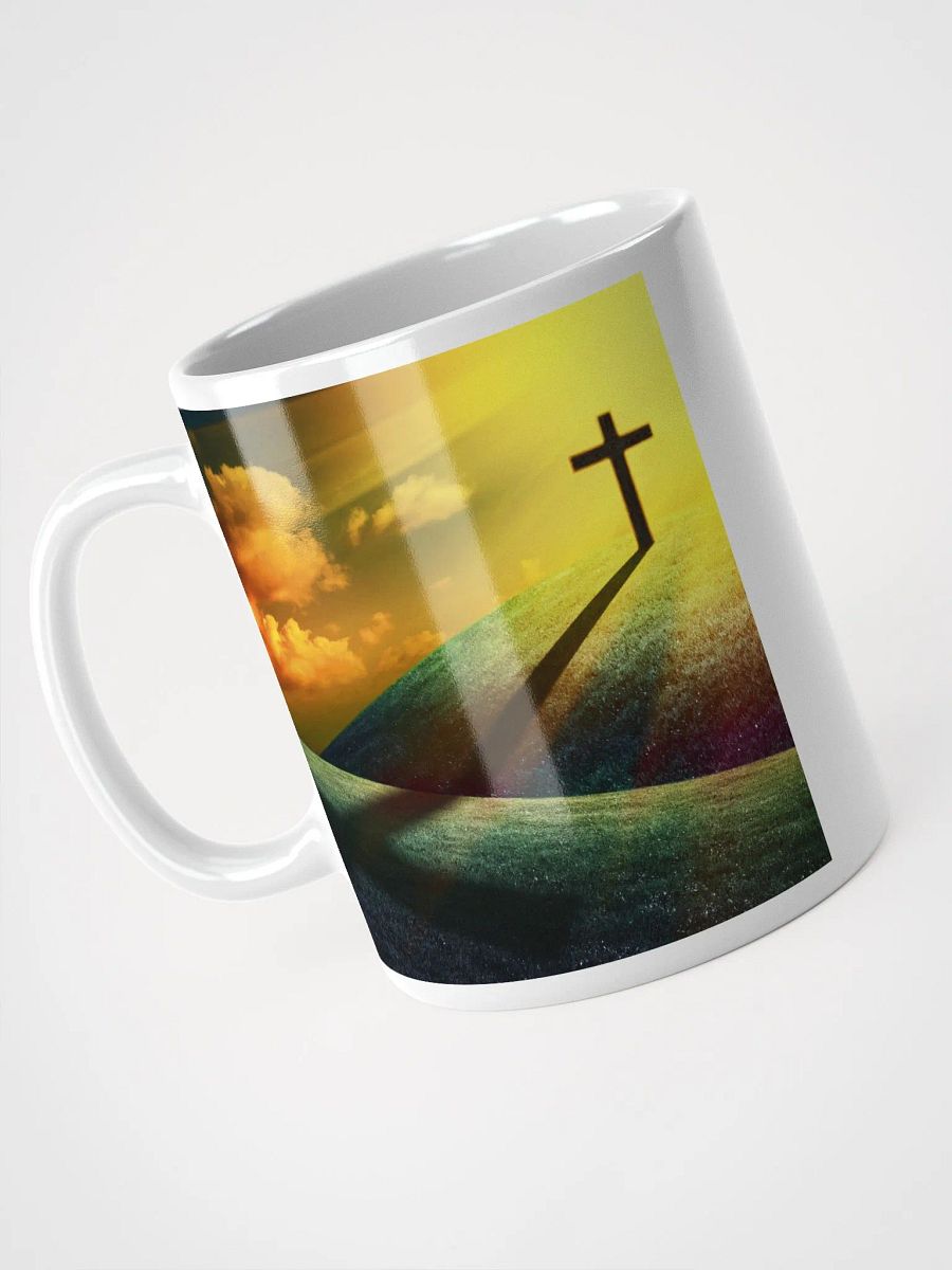 Wooden cross standing on a hill, silhouetted against a vibrant & colorful sky & a cross with a vivid, dramatic background Mug product image (3)