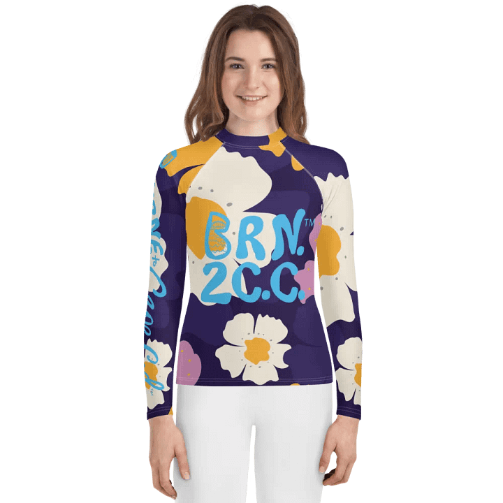 Girls' | YOUTH | Rash Guard | BRN.2C.C.™ Front Graphic | BOURNE to Cape Cod™ Sleeve & Back Logo | Coastal Swim Shirt for Kids | UV Protection Activewear | Blue Logo | Bold Purple Floral product image (1)