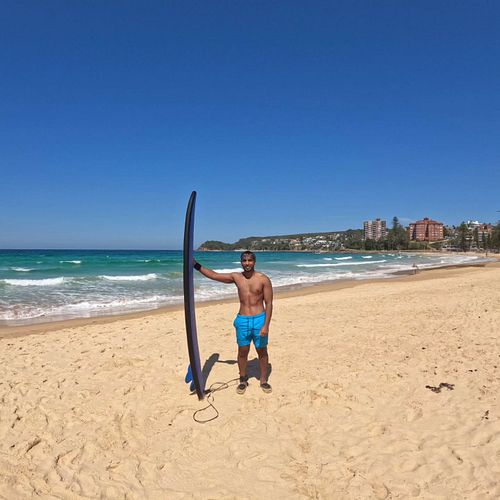 Catching waves and dodging sharks 😅 🏄‍♂️🦈