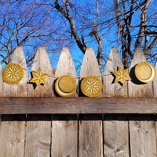made some risograph garlands! these are printed in flat gold and black ink on a few different paper colors and cut by hand. i...