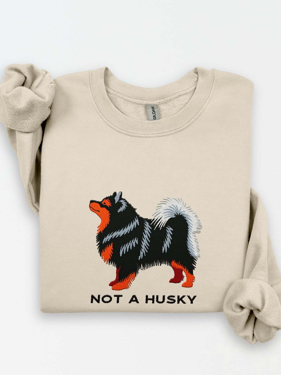 Not a Husky Sweatshirt (Embroidered) of a Finnish Lapphund(Black & Tan) product image (1)