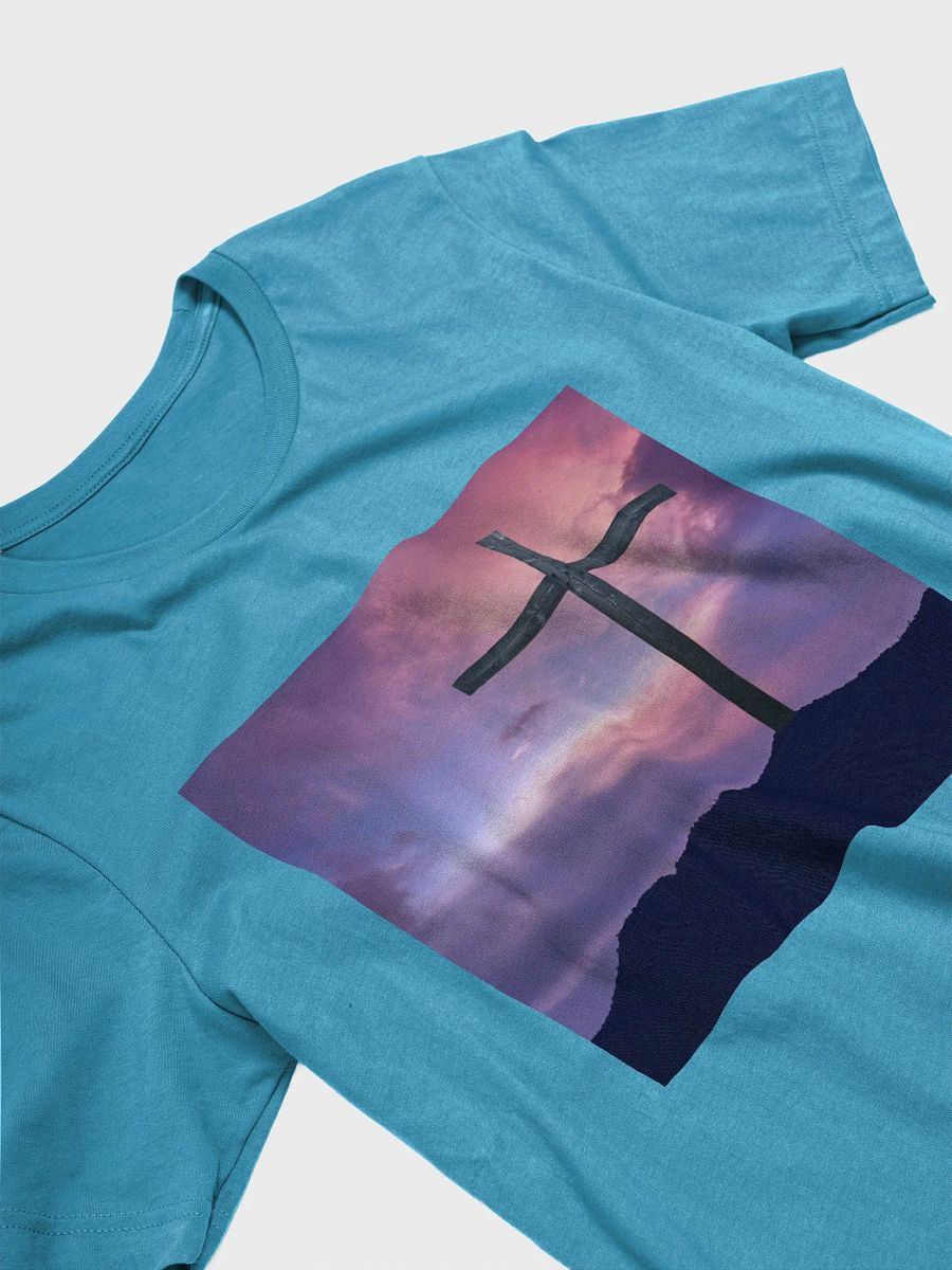 Wooden cross standing on a hill, silhouetted against a vibrant and colorful sky transitioning from deep purples to pinks t-shirt product image (10)