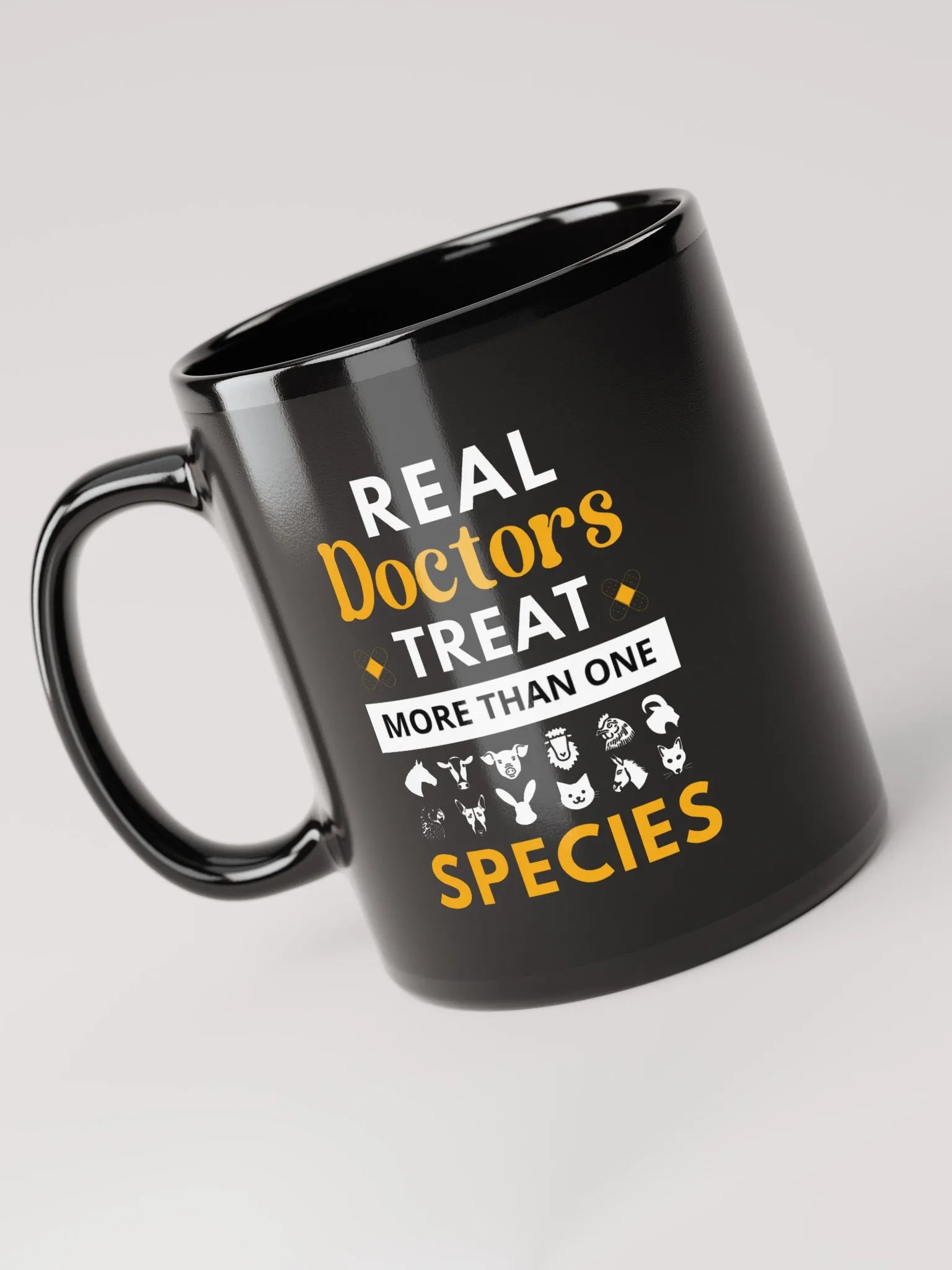 "Real doctor treat more than one species" black glossy mug product image (6)