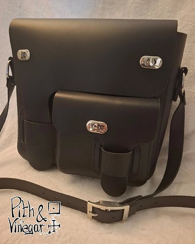 This is the kind of bag that gets better the longer you own it. The leather softens, the edges pick up character, and every m...