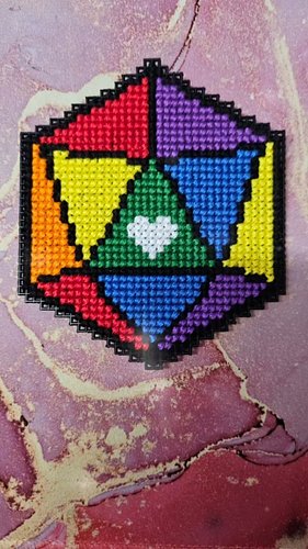 **D20 PRIDE FLAG PLASTIC CANVAS COASTER**
I finally did it... it took so much more time than I anticipated, but I did it. Pat...