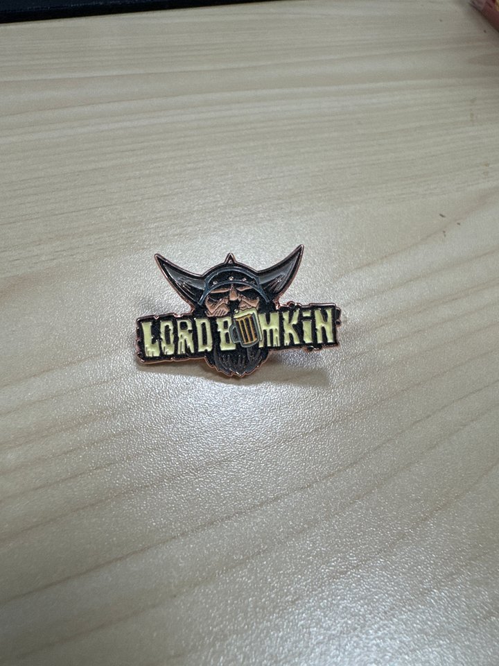 Limited glow in the dark logo pin product image (1)