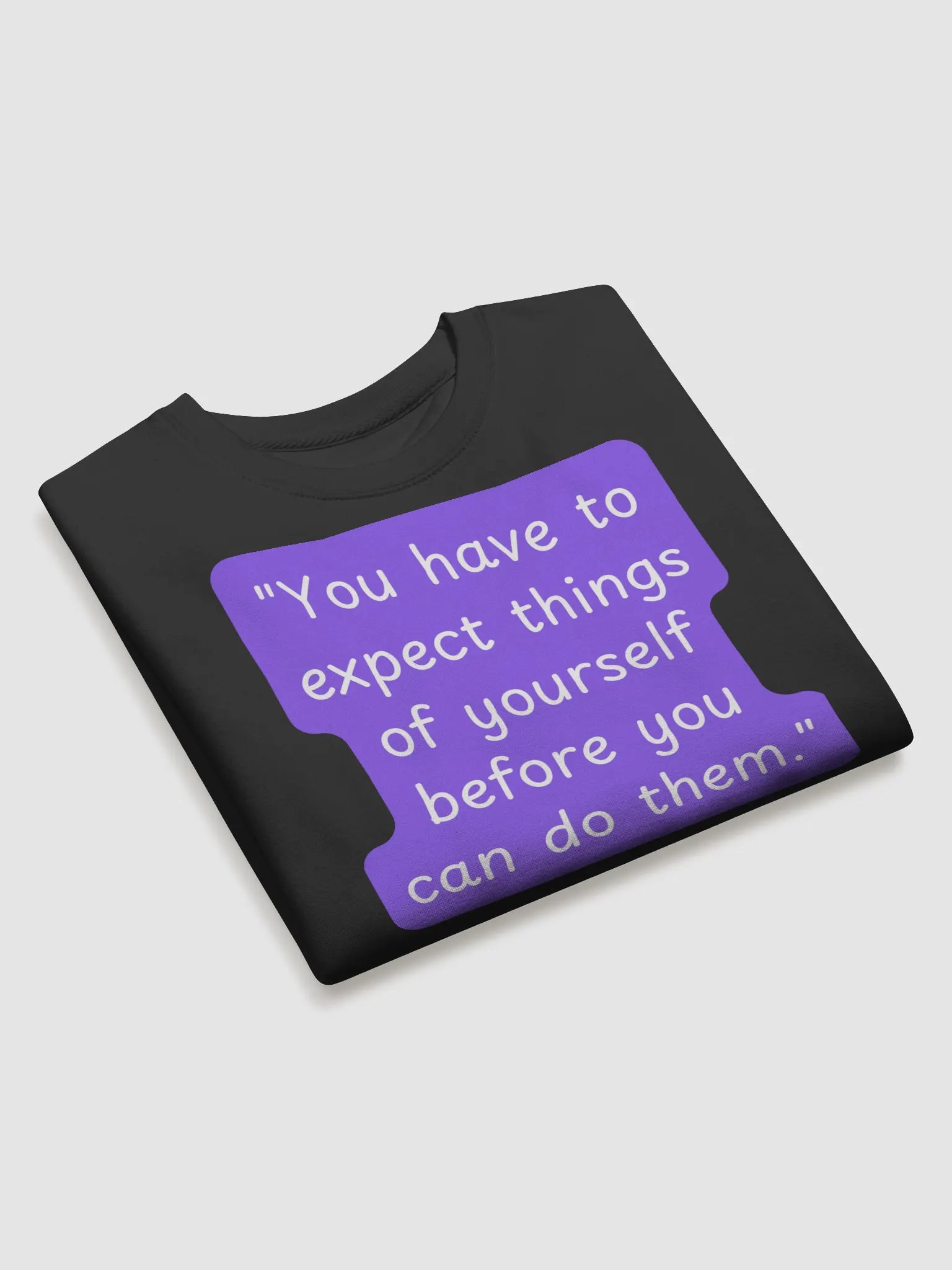"You have to expect things of yourself before you can do them." SWEATSHIRT product image (3)