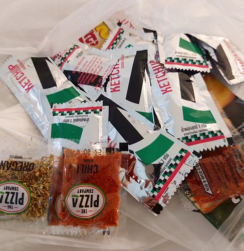 This is an old pic for reference.
I can't tell you how many packets of ketchup/random condiments and spices I've thrown away ...