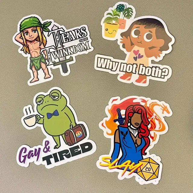 These four new vinyl beauties are coming soon! Are you living the Gay & Tired life, or are you here to Slay the day? Maybe you're on a quest in the Twinkom or just realizing you love both more than one kind of plants (or people 😉) #Stickers #NewArrivals #QueerArt #FantasyArt #D20 #gay #bisexual