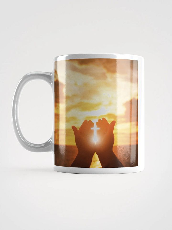Cupped hands holding a glowing cross silhouette & Wooden cross being held up against the backdrop of a sunrise Mug product image (2)