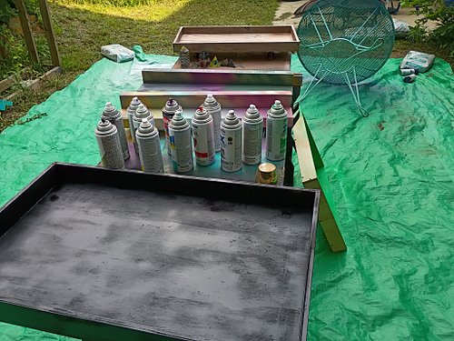 Wife went to town using all the spray paint that has been taking up space in the garage!!!! I love it!  This is a setup for a...