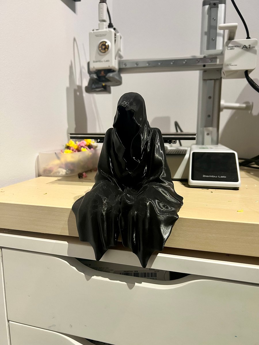 Sitting Cloaked Figure product image (1)