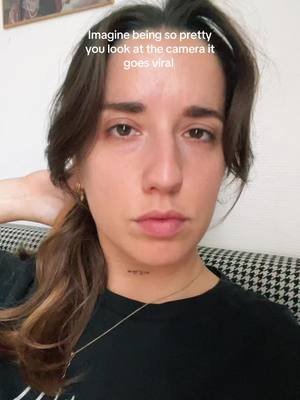 Imagine being so pretty you just look at the camera it goes viral I mean 