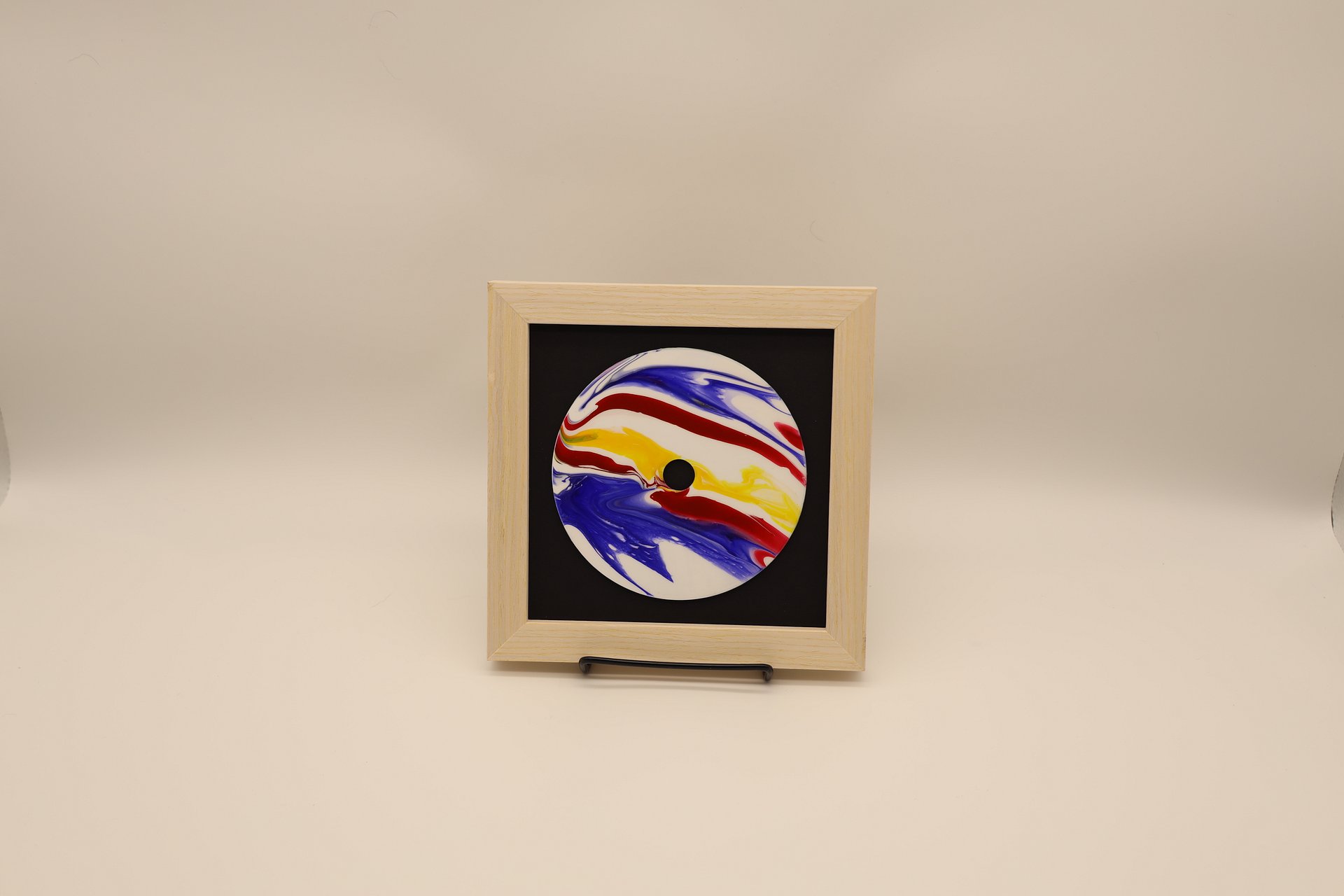 Framed Acrylic Pour Painting on CD - Blue, Yellow, and Red product image (2)