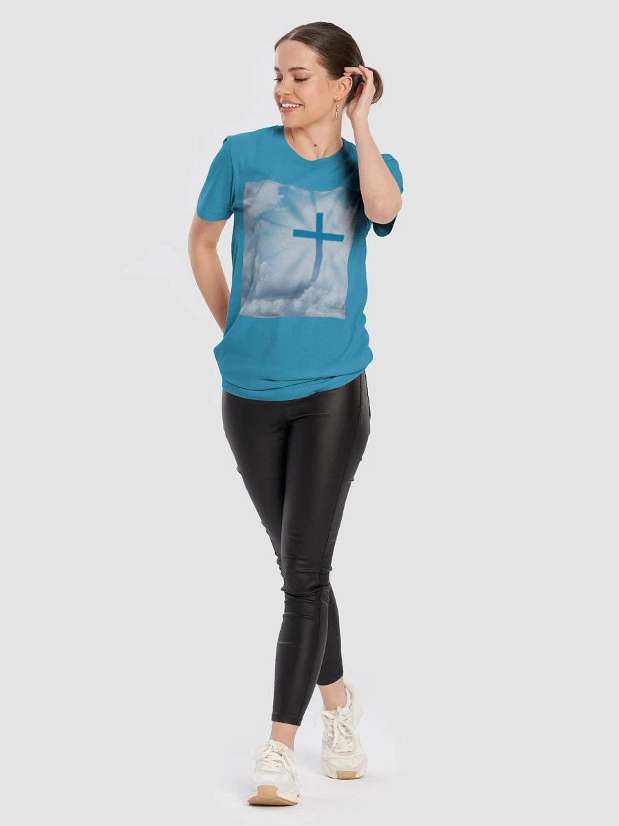 A cross surrounded by a heavenly scene, with rays of light shining through soft clouds in a bright blue sky t-shirt product image (4)