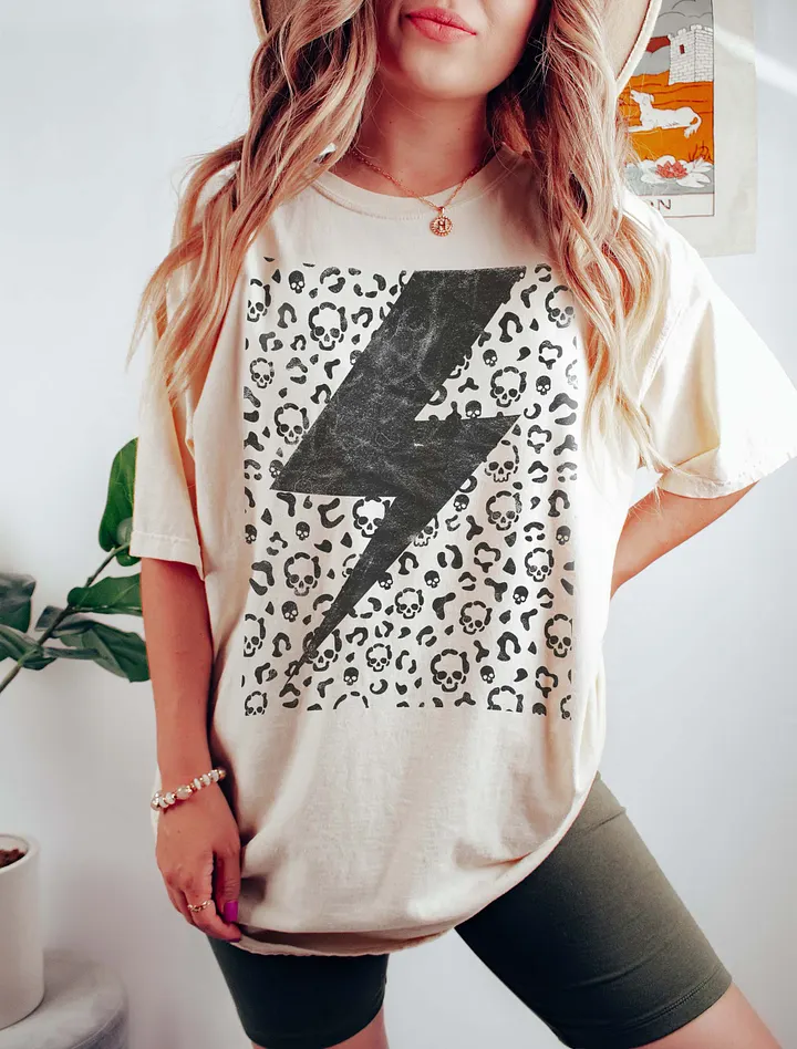 Lightning Bolt on a Leopard Print Pattern of Skulls T-Shirt | Trendy Fall and Halloween Design product image (6)