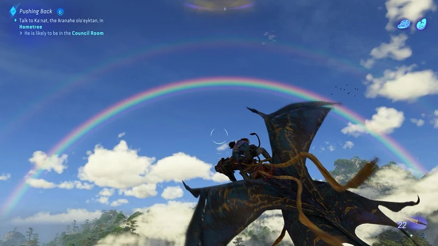 A Na'vi rides an Ikran through the sky as a rainbow appears