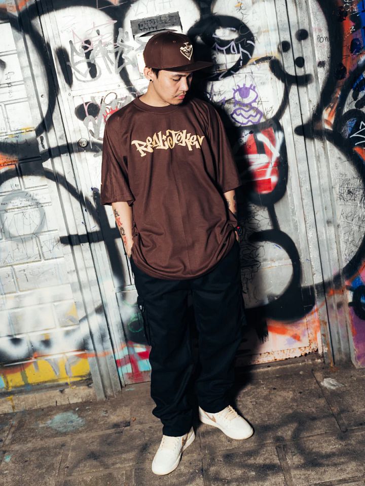 REAL JOKES STAMP - BROWN Oversized Unisex Tshirt product image (1)