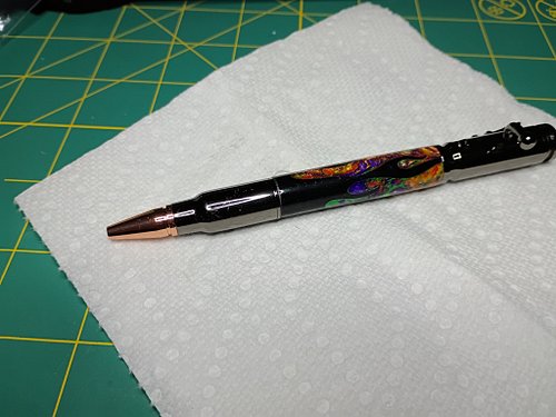 Got better pictures too take, but I got excited and had to share.  Just off the lathe, cast way cool colors on a discarded la...