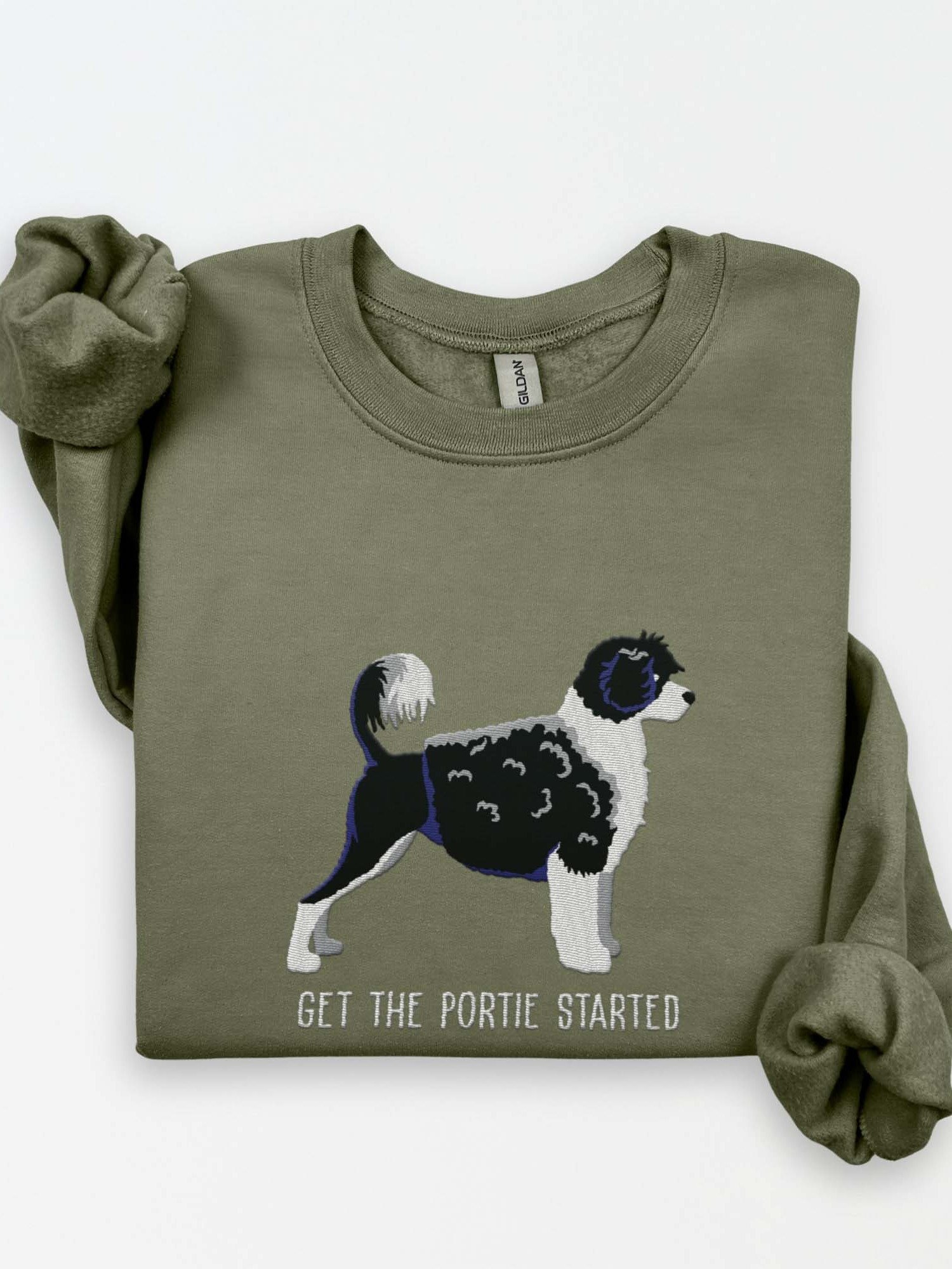 Get the Portie Started Sweatshirt (Embroidered) of a Portuguese Water Dog(Black & White) product image (1)
