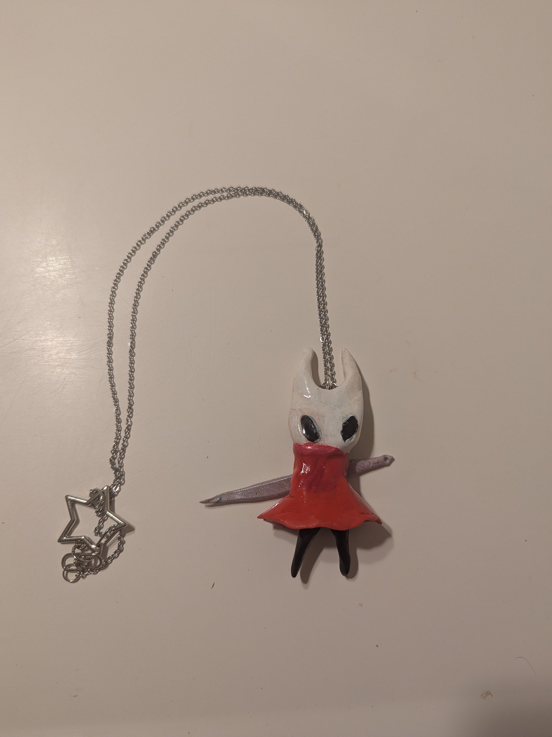 Handmade Hollow Knight Hornet Necklace – Polymer Clay Pendant with Star Clasp product image (2)