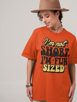Fun-Sized Fabulousness Tee: Embrace Your Vertical Advantage! 👕 Embrace your fun-sized stature with our latest graphic tee! 😄 Stand tall and show off your unique style with our 'I'm Not Short, I'm Fun Sized' tee. Available now in various sizes!  #FunSized  #GraphicTee  #StandTall  #UniqueStyle  #FashionStatement  #ShortAndProud  #FunSizeFashion  #TeeOfTheDay  #QuirkyApparel  #ExpressYourself  #ShortPeopleProblems  #FunSizedFashion  #tshirtshop  #HumorousApparel  #CasualStyle  #ConfidenceBoost  #Fashionable  #TShirtDesign  #WearWithConfidence  #FunFashion  #ShortAndSassy  #SizeDoesntMatter  #BeYourself  #Fashionista  #ShortAndSweet  #EveryInchCounts #thewolfandthebutterfly