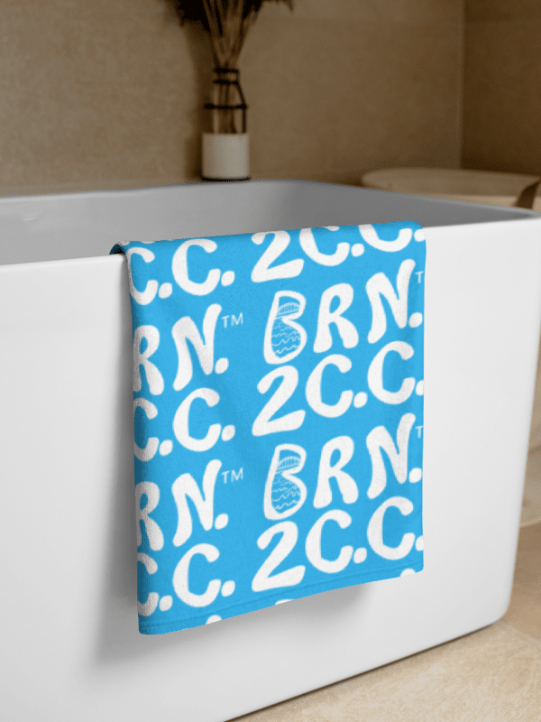 BRN.2C.C.™ | Coastal Classic Beach Towel | All-Over Logo Print | Vibrant Colors for Salty Souls | White Logo on Deep Sky Blue product image (2)