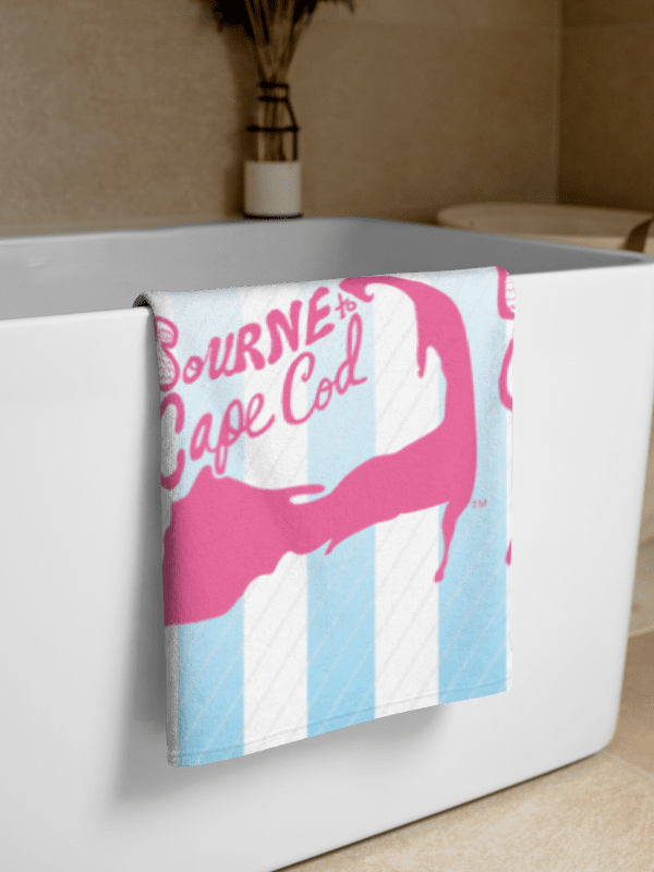 BOURNE to Cape Cod™ | Coastal Classic Beach Towel | All-Over Logo Print | Light Pink Logo on Light Blue Stripes product image (2)