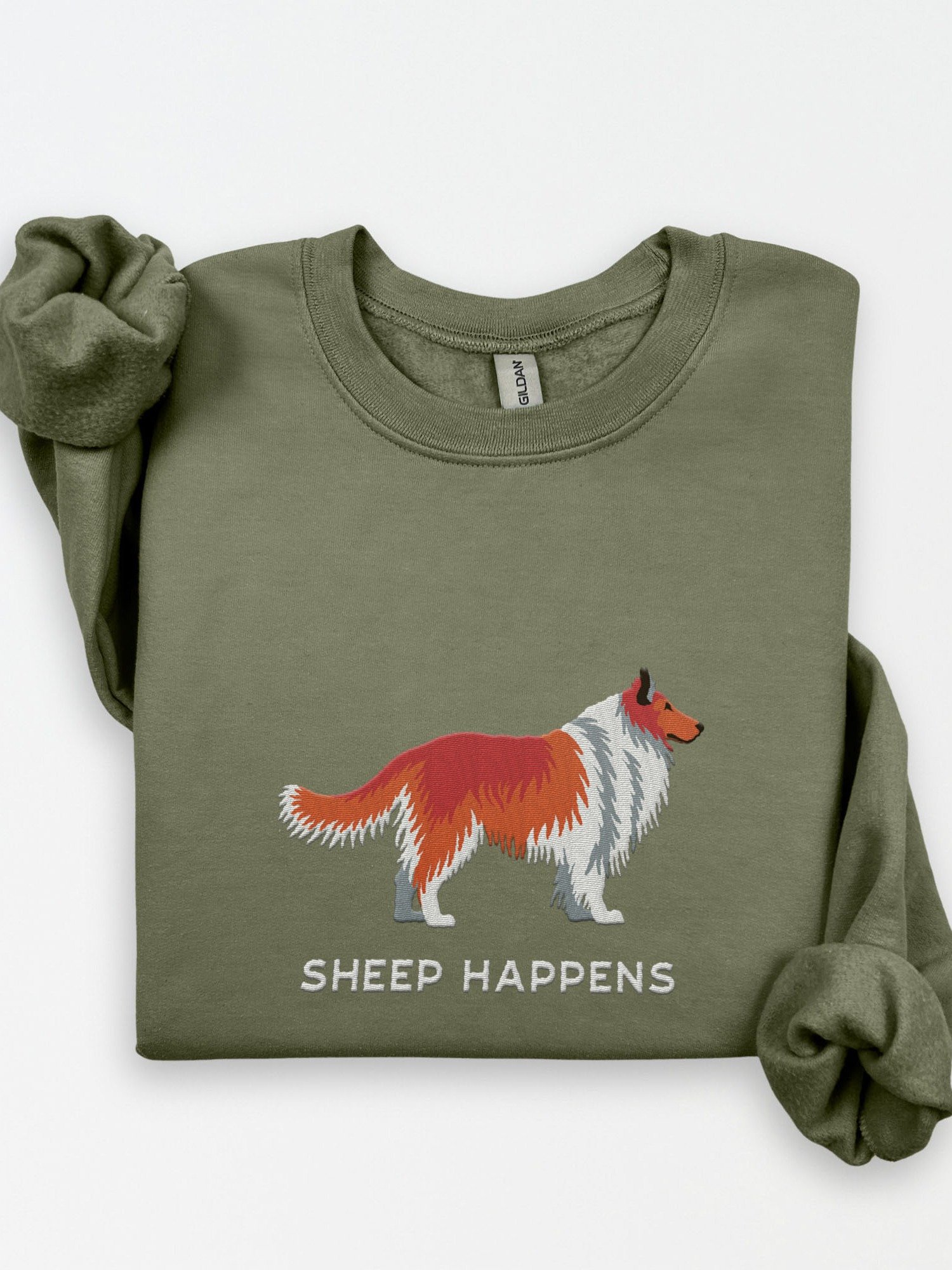Sheep Happens Sweatshirt (Embroidered) of a Shetland Sheepdog(Red) product image (1)