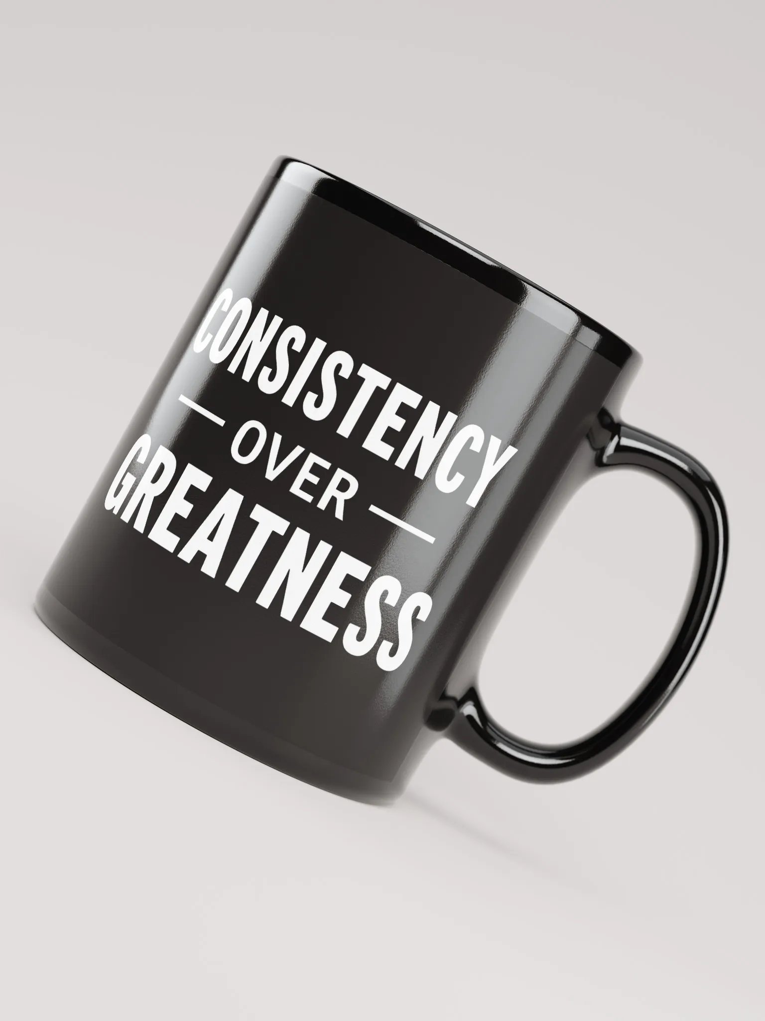 Unleash Your Inner Champion: The Rock’s Consistency Over Greatness Mug – Fuel Your Journey, One Sip at a Time product image (4)