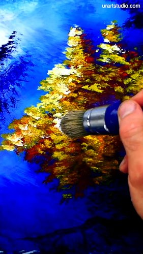 In this one-minute step-by-step art video by URARTSTUDIO, learn how to paint a beautiful yellow tree in a peaceful blue lands...