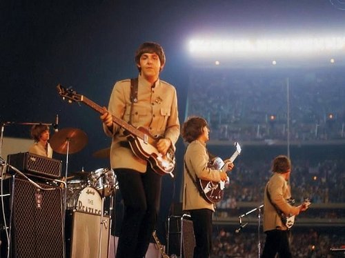 Paul McCartney locks eyes with the camera during The Beatles’ legendary concert at Shea Stadium, August 15, 1965.
Ringo Starr...