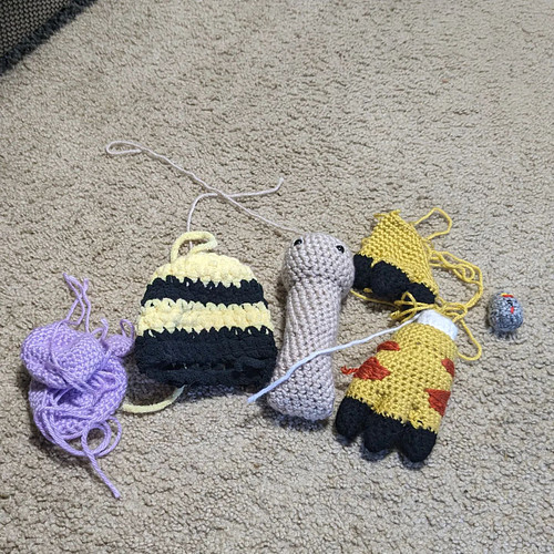 GROUP PHOTO

Left to Right: Chibi Espeon, Plush Bumblebee, S'mores Snail, Gatomon, and lastly my attempt at creating a Gundam...