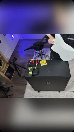 This guitar is oddly satisfying to play. It plays like a bass, and has super beefy strings in a basically bass tuning, but id...