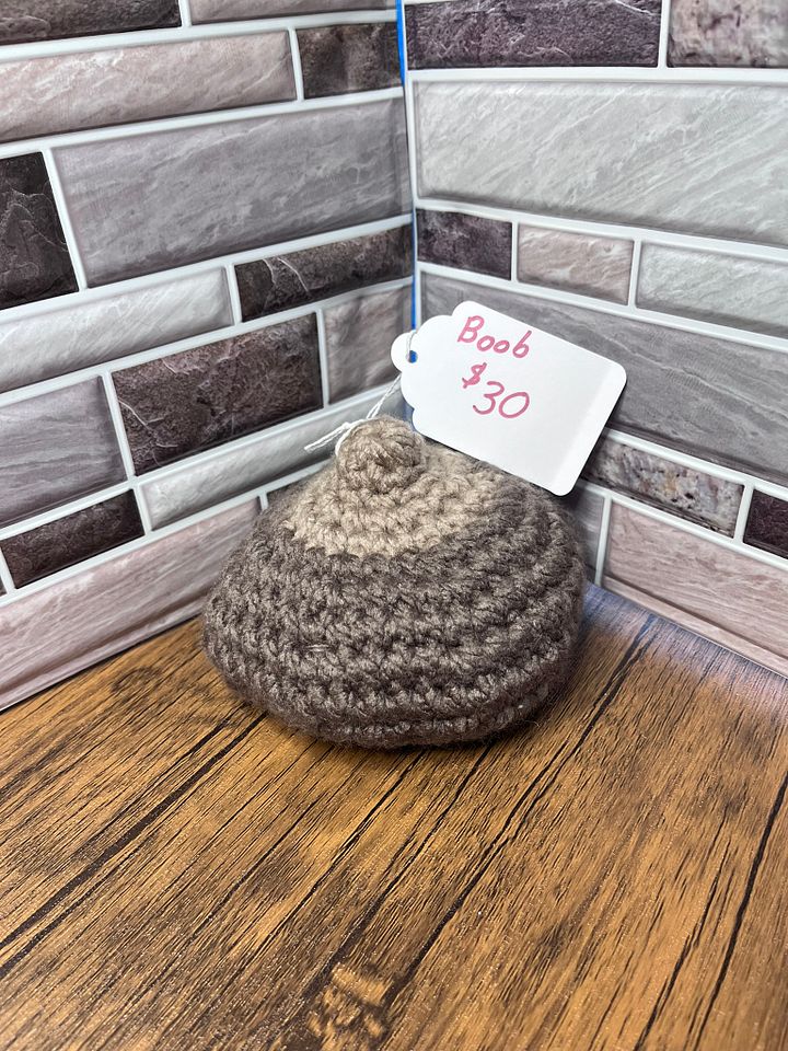 Dark-colored breast stress ball product image (1)