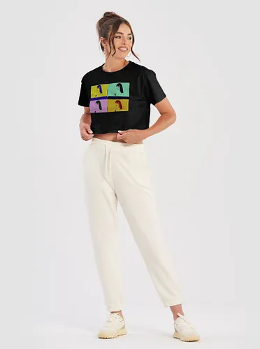 Featuring a vibrant pop art composition, this crop top offers a relaxed fit and exceptional softness, crafted from 100% combe...