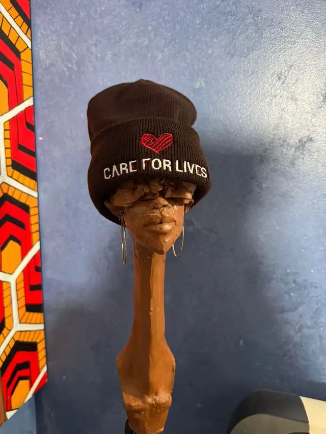 The Care 4 Lives Cuffed Beanie combines warmth, comfort, and style. It is designed for those who want to stay cozy while promoting a message of self-care and well-being. This beanie keeps you warm during colder weather without compromising on fashion. Whether outdoors, running errands, or enjoying a casual day, it is a stylish and functional addition to your wardrobe. Key features of the Care 4 Lives Cuffed Beanie include: Premium Material: Made from a soft, high-quality acrylic blend, this beanie provides warmth and comfort while remaining lightweight and breathable, ensuring you stay cozy throughout the day. Classic Cuffed Design: The cuffed style offers a timeless look, and its snug fit provides extra warmth around your ears, making it perfect for chilly days. Care 4 Lives Branding: Featuring the Care 4 Lives logo, promotes health, self-care, and well-being in all aspects of life. @Care 4 Lives  https://care4lives.store