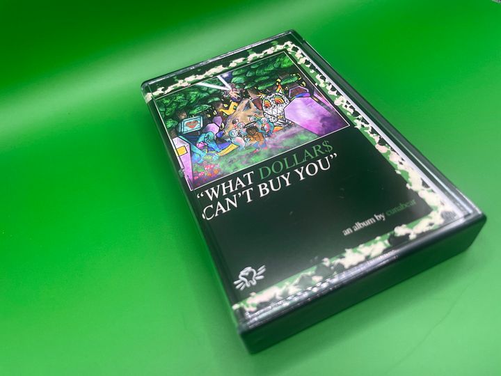 “Epitaph Stone” - “What Dollar$ Can’t Buy You” Standard Edition Cassette Tape product image (2)