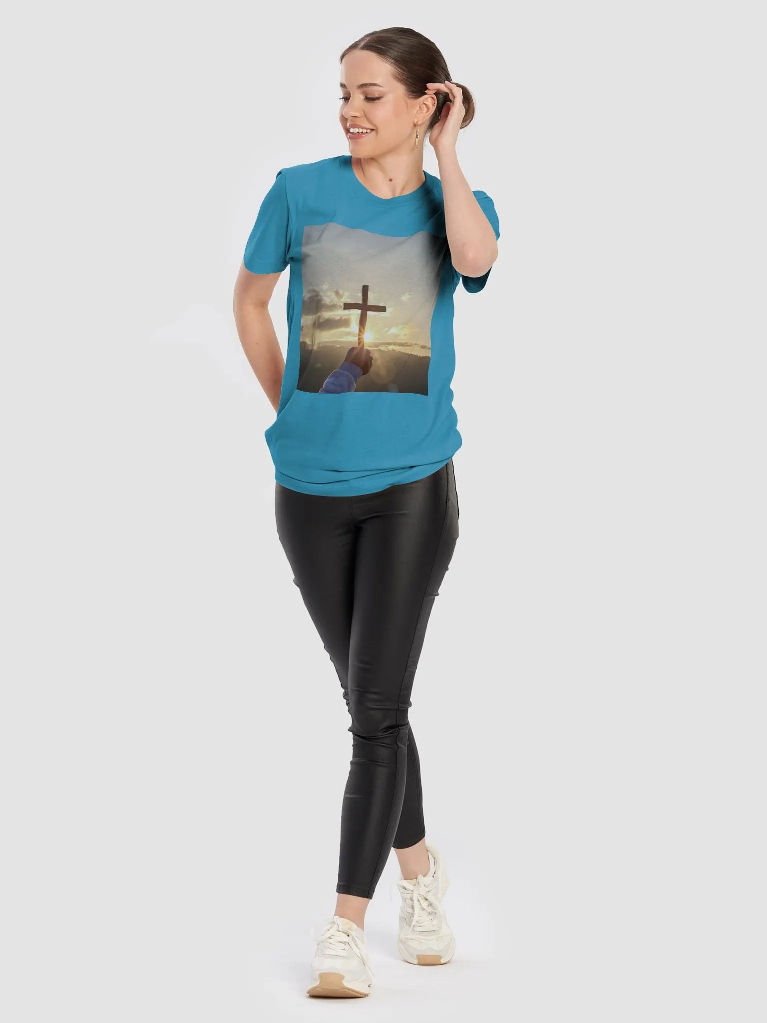 Wooden cross being held up against the backdrop of a sunrise t-shirt product image (9)