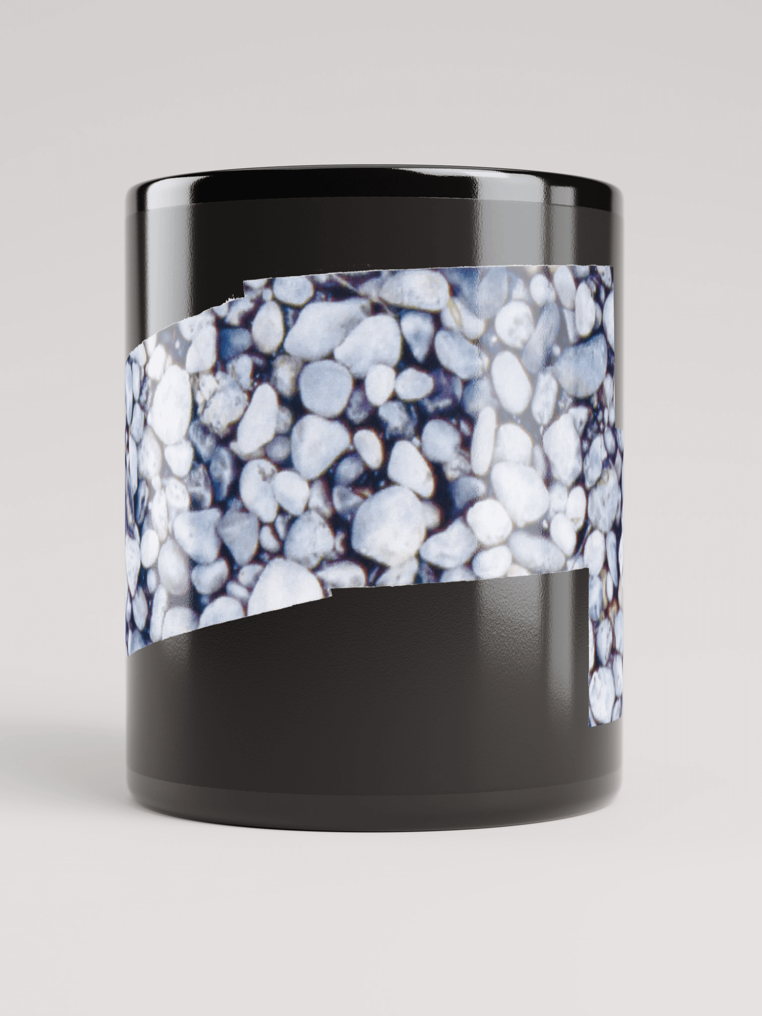 Cama Beach Rocks on black glossy mug product image (5)