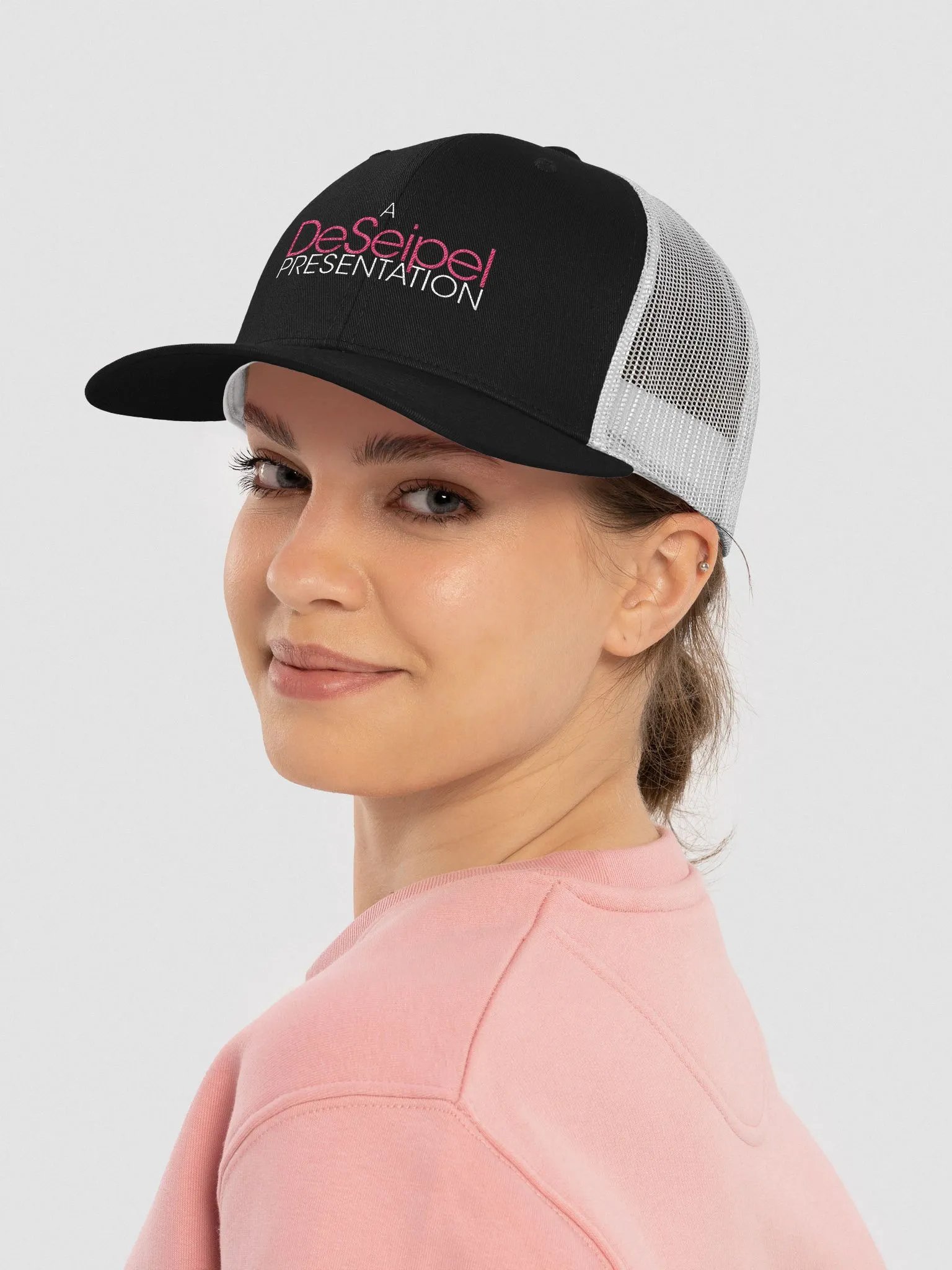 A DESEIPEL PRESENTATION TRUCKER HAT product image (1)