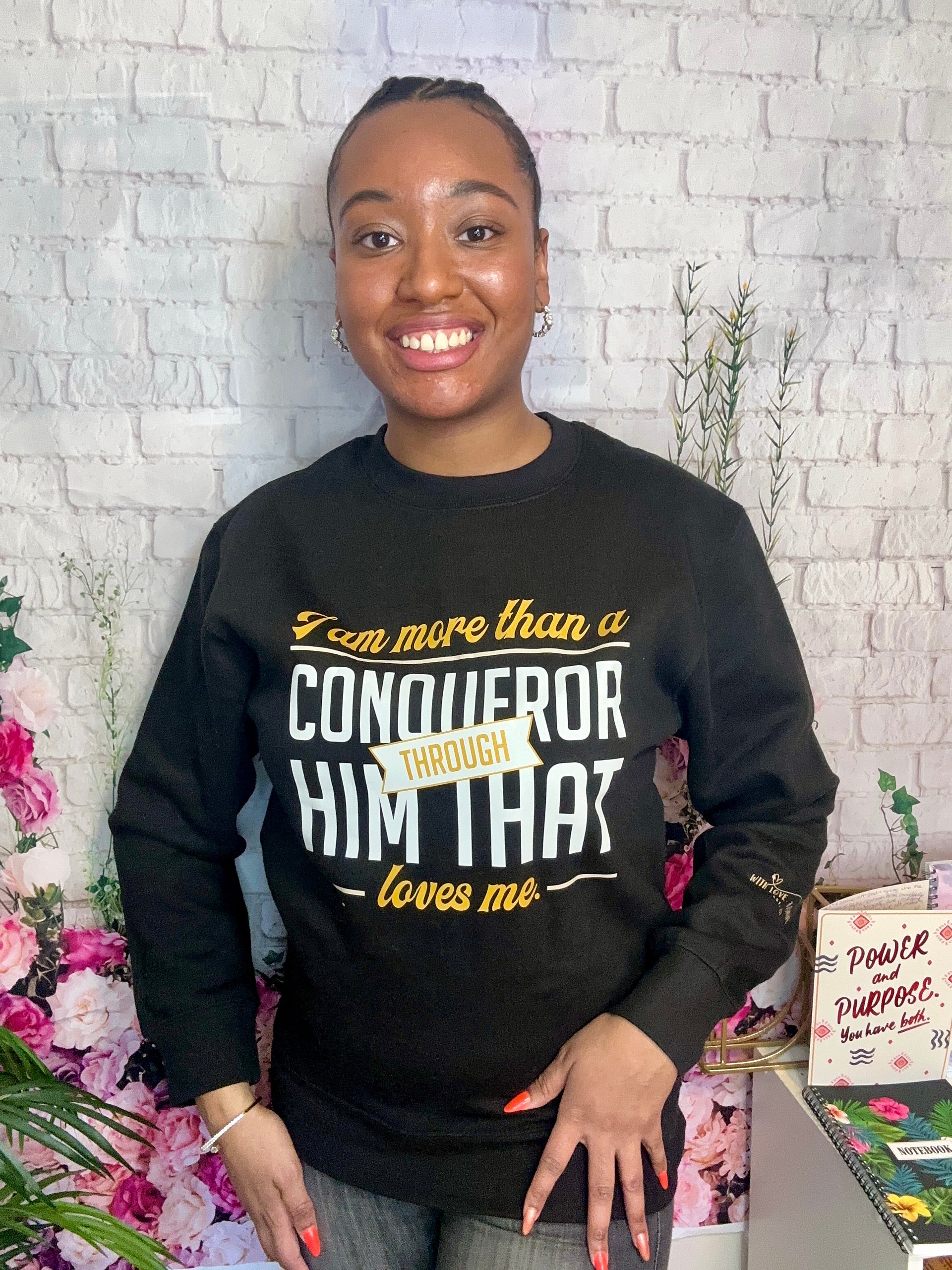 I AM MORE THAN A CONQUEROR THROUGH HIM THAT LOVES ME CREWNECK SWEATSHIRT product image (1)