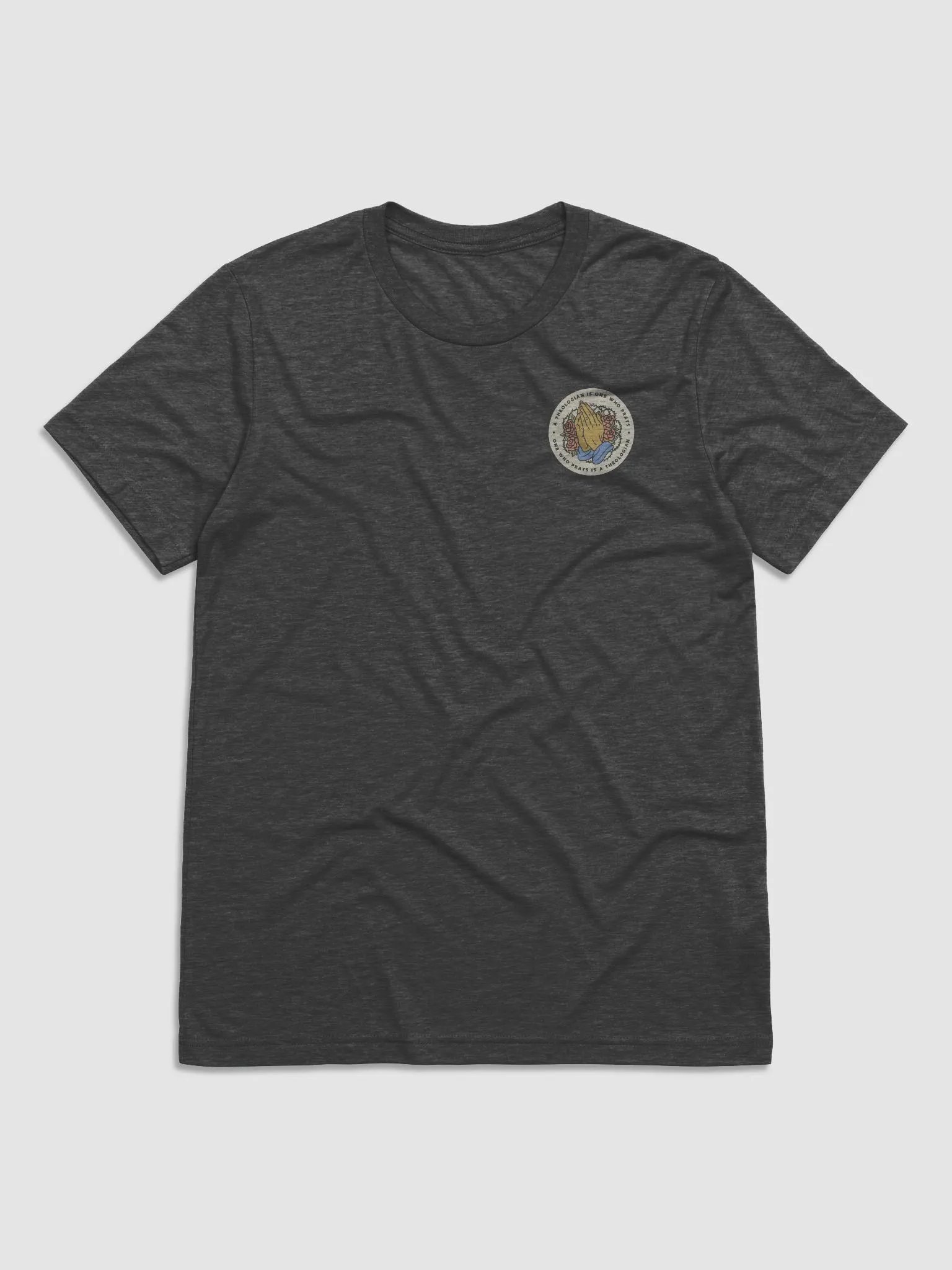 A theologian is one who prays t-shirt product image (1)