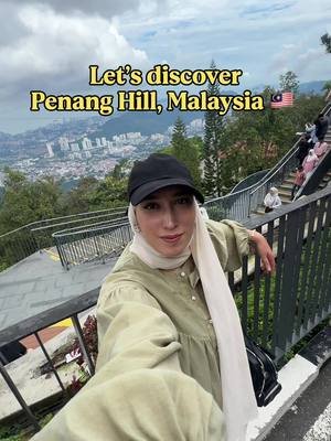 Today I finally made it up to Penang Hill… and honestly, it feels like a little world above the world. You get there by taking the funicular train — super steep, super fun, and the view gets better with every minute. And once you reach the top, it’s just green everywhere: quiet walking paths, fresh air, and that feeling of being wrapped in nature even though the city is right below you. I explored the Gate House, stopped at a few viewpoints, and ended the day with the famous panoramic view — Penang from above is unreal. And even though I didn’t record everything, Penang Hill has way more to offer than what’s in this reel. There are cozy cafés, local food stalls, cute gift shops, peaceful spots to just sit and breathe, and even guided hiking trails if you’re in the mood for a little adventure deeper in the forest. If you’re planning a trip to Penang, definitely add this place to your bucket list #malaysia #penang #travel #explore 